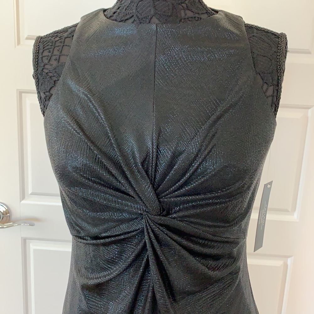 NWT. Tahari black metallic body con dress with beautiful front detail. Size 2